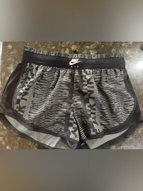 Nike women’s Black and Gray Athletic Shorts with Nike Air Logo